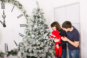 Christmas Family Portrait In Home , House Decorating By Xmas Tree photo