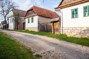 Rimetea is a small village located in Transylvania, Romania. It is situated in the Apuseni Mountains and is known for its picturesque setting and well preserved Hungarian architectural style. photo