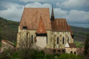 Biertan a very beautiful medieval village in Transylvania, Romania. A historical town in Romania that has preserved the Frankish and Gothic architectural style. Travel photo. photo