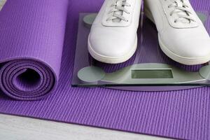 gymnastic mat, scales, sneakers, sports at home photo