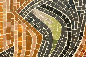Colorful ceramic mosaic on the walls of the building. Abstract background and texture for design. photo