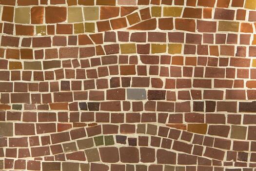Colorful ceramic mosaic on the walls of the building. Abstract background and texture for design. photo