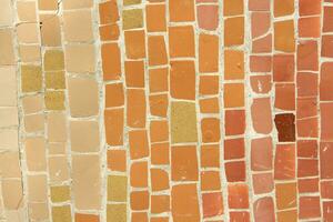 Colorful ceramic mosaic on the walls of the building. Abstract background and texture for design. photo