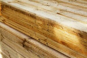 Lumber for construction - wood is layered photo