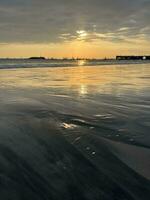 puesta de sol en la playa foto