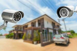 CCTV camera security operating at house. photo