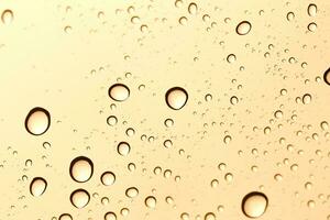 Gold water drop on glass mirror background. photo