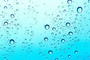 Blue sky water drop windshiled background. photo