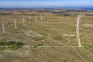 Aerial view at wind turbine farm. Horizontal view photo