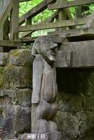 Wooden Troll Under the Bridge in Littlebeck photo