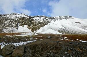 Beautiful Remote Landscape with Summer Snow Melt photo