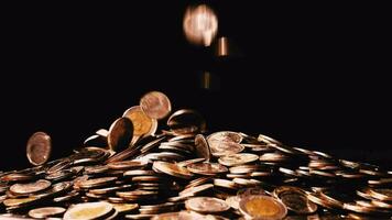 Stacks of money and coins that fall. Receive money from savings the concept of saving money video