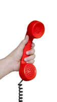 Old fashioned red desk phone headset in hand isolated PNG transparent