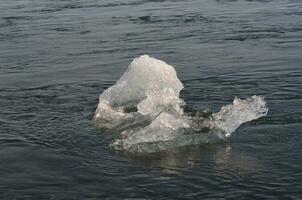 Cool photo of a chunk of glacier in the water