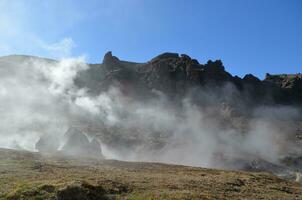 Steaming Landscape Over Fumaroles and Hot Springs photo