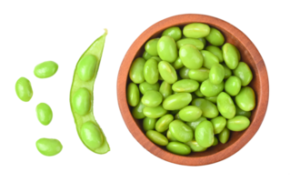 Green soy beans in wooden bowl on transparent png top view.