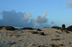 California Lighthouse in Aruba Surrounded by Sand photo