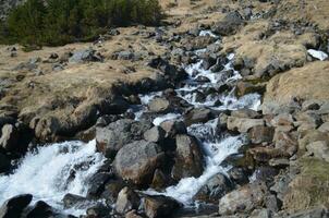 Looking Down a Waterfall on Snaefellnes Peninsula in Iceland photo