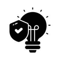 Safety shield with tick mark inside light bulb, concept of idea protection icon vector