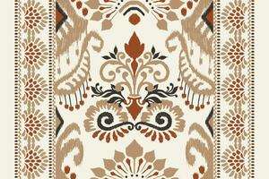 Ikat floral paisley embroidery on white background.Ikat ethnic oriental pattern traditional.Aztec style abstract vector illustration.design for texture,fabric,clothing,wrapping,decoration,sarong,scarf