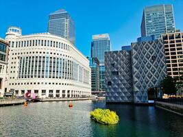 Low Angle View of Canary Wharf Buildings at Central London City of England Great Britain. The Footage Was Captured on June 8th, 2023 During Clear Sunny Day. High Resolution 64 Mega Pixels Image photo