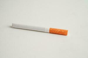 Cigarette, roll tobacco in paper with filter tube, No smoking concept. photo