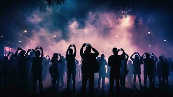 Audience using smartphones to capture photos at a live concert. silhouette concept