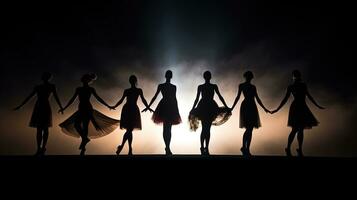 Modern ballet performers in shadow. silhouette concept photo