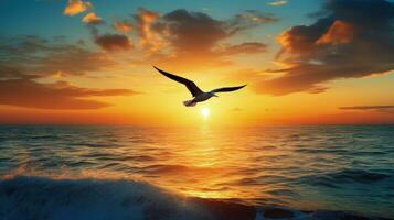 maravilloso mar puesta de sol con pájaro silueta volador foto
