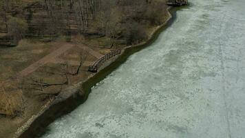 aerial view of a frozen lake in the park video