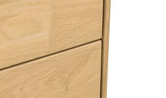 Bedside table with drawers close view photo, wooden eco furniture elements background. Solid wood furniture details photo