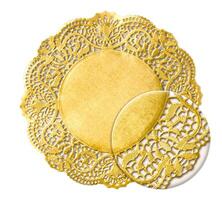 Golden confectionery napkin with decorative texture under magnifying glass photo
