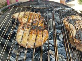 Lamb testicles on the barbecue photo