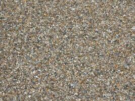 Pebble stones background, natural pattern surface photo