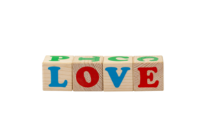 Children's wooden cubes with blue, red and green letters with the word love lying side by side. No background. High quality photo. png