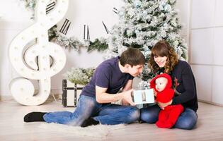 Christmas Family Portrait In Home , House Decorating By Xmas Tree photo