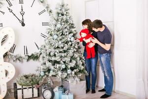 Christmas Family Portrait In Home , House Decorating By Xmas Tree photo