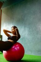 Exercise The joy of exercise. Happy young woman smiling from exercising photo