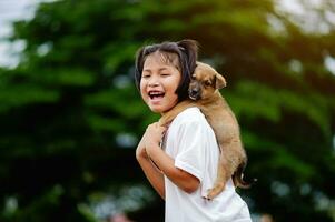 little girl and dog Love between man and dog Bonding of children and intelligent pets playing in the backyard love concept photo