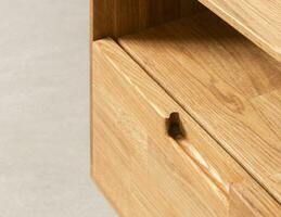 Drawers close view photo, wooden furniture elements background. Furniture details photo