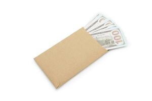 dollars in paper envelopes. cash, money, isolated on white background, us dollars, for text. To do illegal business, corruption in the contracting business. photo