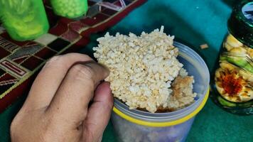 Rengginang is a thick traditional cracker photo