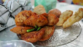 Weci. Bala-bala or Bakwan vegetable fritter, traditional Indonesian snack photo