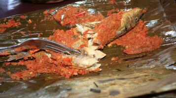 Pepes is a typical way from Java to process food usually for fish, using banana leaves to wrap seasonings photo