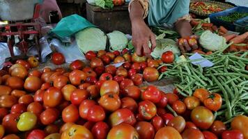 Mothers shopping for vegetables in traditional markets photo