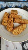 Indonesian traditional meal named Tempe Goreng. photo