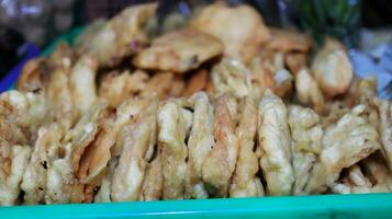 Angkringan is a wheelbarrow to sell various kinds of food and drinks on the roadside photo