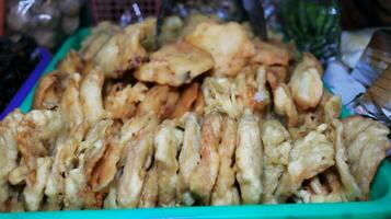 Angkringan is a wheelbarrow to sell various kinds of food and drinks on the roadside photo