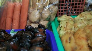 Angkringan is a wheelbarrow to sell various kinds of food and drinks on the roadside photo