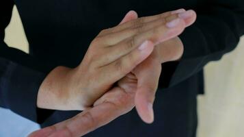 Hand of lady that applying alcohol spray or anti-bacteria spray to prevent the spread of germ photo